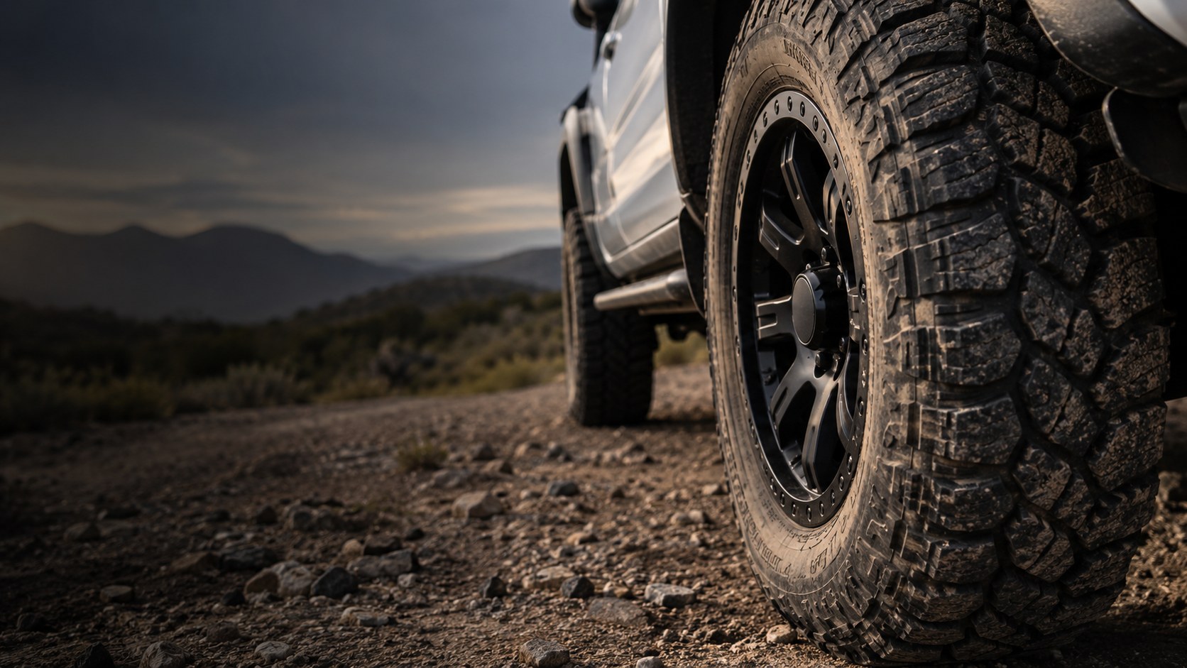 Close-up of an all-terrain tyre and alloy wheel on a four-wheel drive